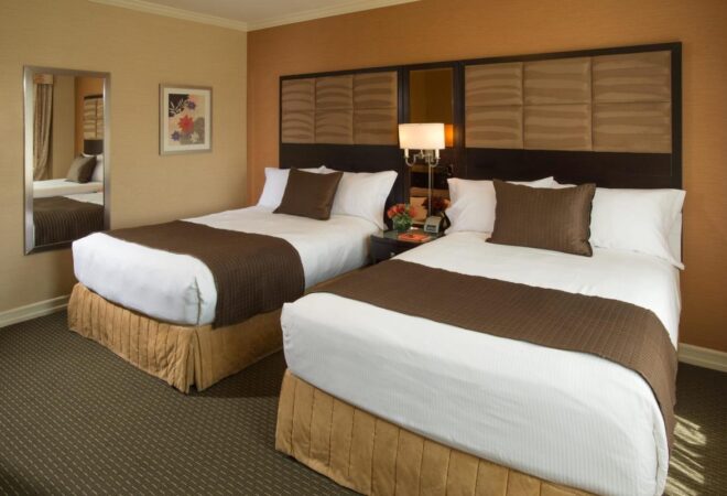 excelsior_hotel_-_guest_room_double_beds_48acc22b-fa97-c919-a29257e78da5b31e